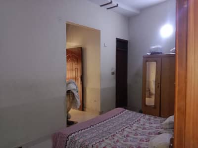 2 Bed Lounge portion available on 2nd floor in Block 15 neat, prime location, ideal for small family.