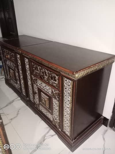 A wooden bed is on sale