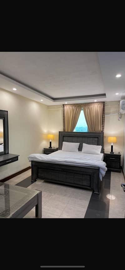 8 beds , side tables , dressing table , 2 seater sofa set and table