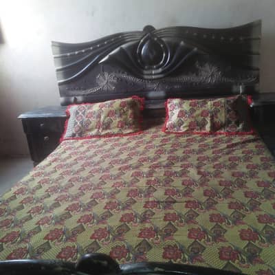 double bed with mattress side table 2door almari and dresing divider. .