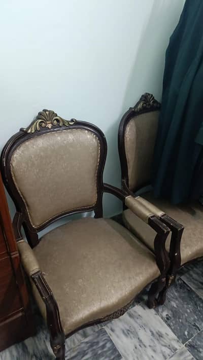 two chairs with centre table