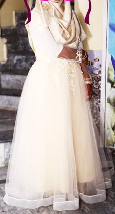 Net maxi with embroidery on the top. High quality.