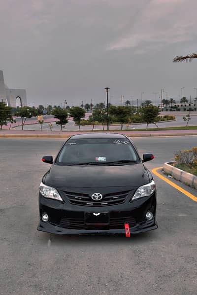 Toyoda Corolla XLi covered GLI