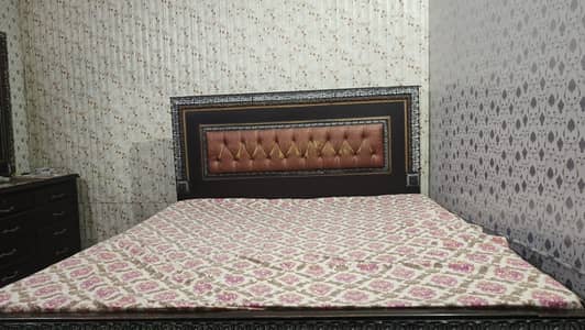 wooden bed conditionl ok urgent sale