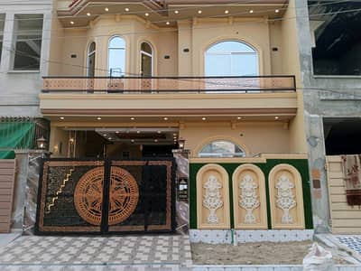 5 Marla House For sale In The Perfect Location Of Eden Boulevard Housing Scheme