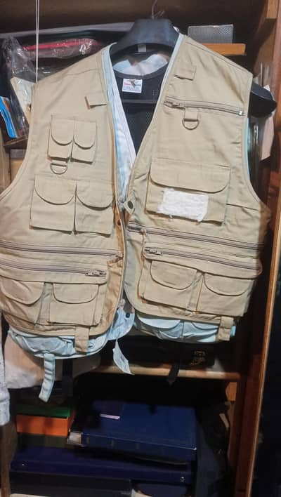 Outdoor vest for fishing and travel. Different pockets to carry things