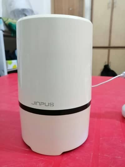 Jinpus Electric Air Purifier/ Cleaner with an extra new filter