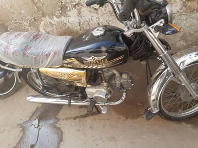 super star 70 brand new  Gold  good condition  karachi