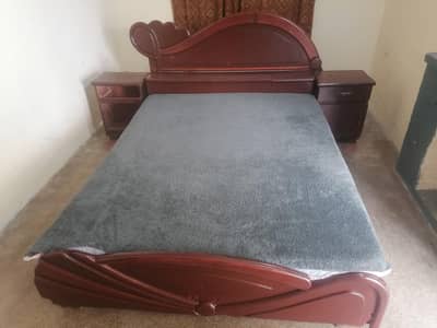 Bed with side table