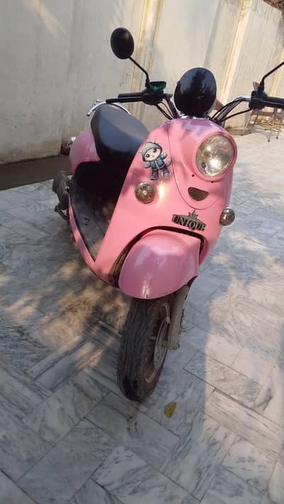 Pink Scooty