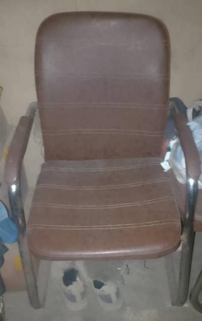 2 brown chairs
