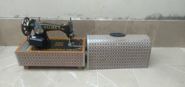 one hand used sewing machine good condition.