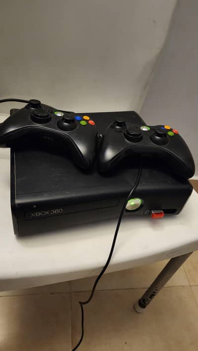 Xbox 360 with controllers