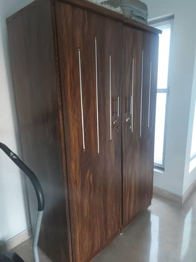 used three door divided cupboard