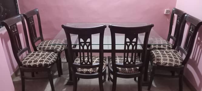 Glassy Dining Table 5ft*3'5ft with six chairs