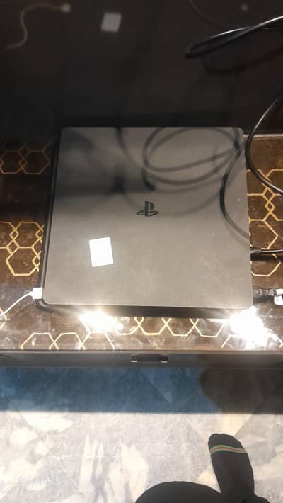 PlayStation [ps4] with two controllers  jailbreak