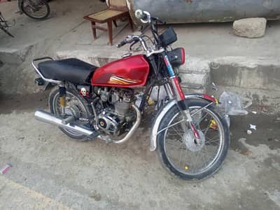 Honda 125 . .