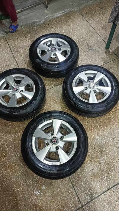 New tyre and alloy rims 12 num suzuki mehran