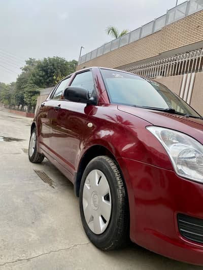 Suzuki swift 2011 model dx variant  totally genion condition