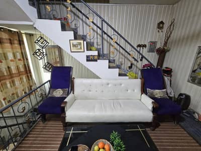 Used 3 seater sofas and 2 sofas. 2 purple coffee chairs