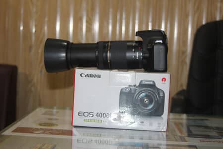 Fresh piece canon 4000d with 75-300mm lens complete box