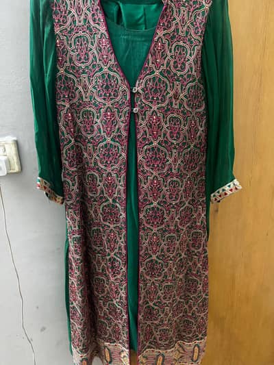 for sale color green n pink dress one time used