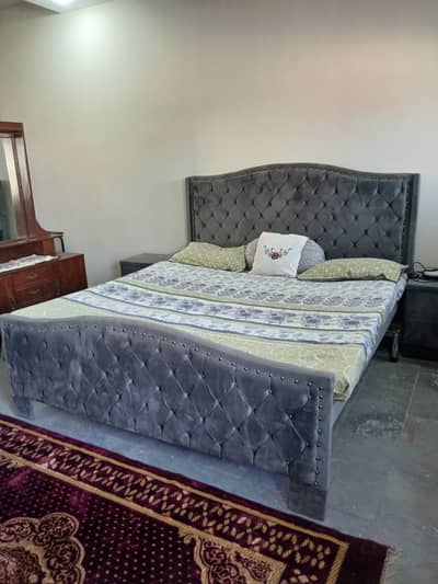 Bed with side tables and dressing