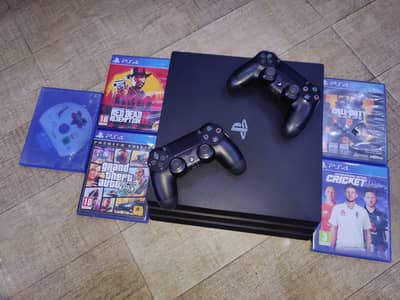 PS4 PRO 1 TB SEALED PACKED WITH 2 CONTROLLERS AND 6 GAMES!!