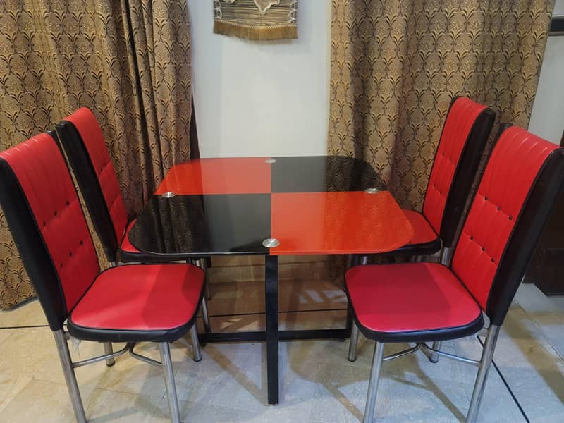 Modern and bold: Stylish Red & Black 4 Seater Glass dining Table. 0