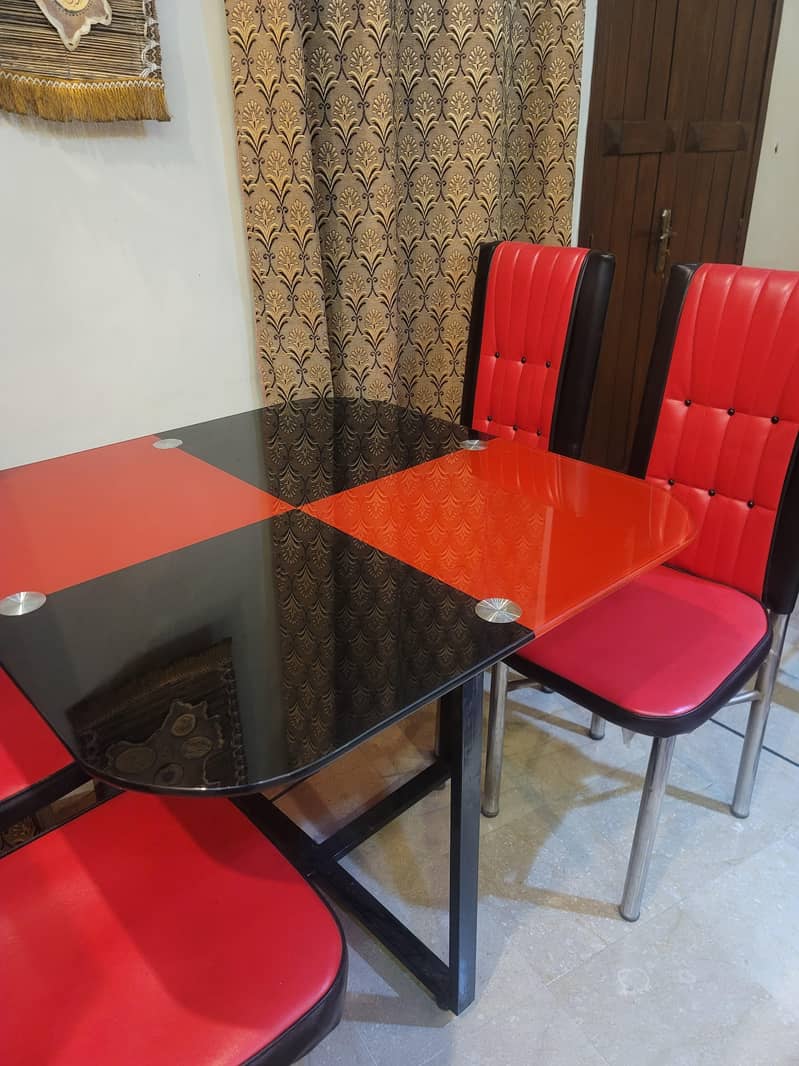 Modern and bold: Stylish Red & Black 4 Seater Glass dining Table. 2
