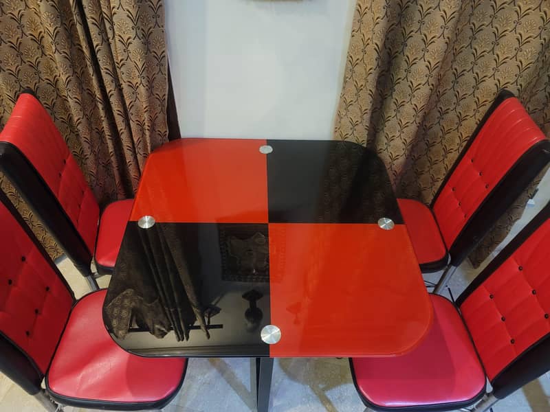 Modern and bold: Stylish Red & Black 4 Seater Glass dining Table. 4