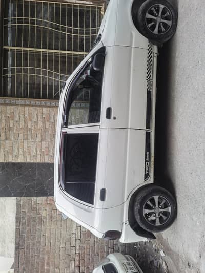 Daihatsu Coure 2004 golden number 6789