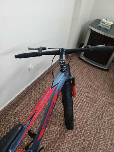 steethawk kids bicycle in blue colour + light red