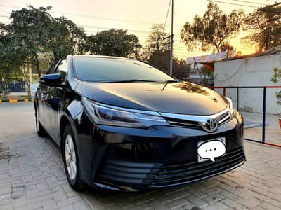 Toyota Corolla Altis Grande Auto 1.8 2014 in very good condition۔