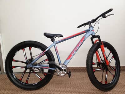 steethawk kids bicycle in blue colour + light red