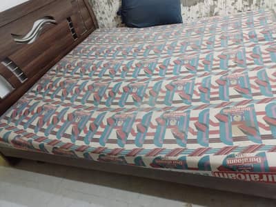 Bed with mattress