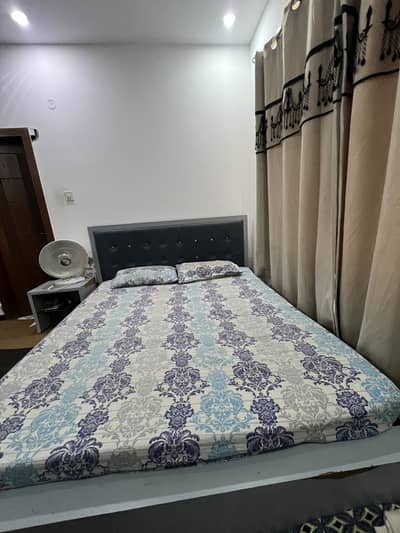 Double bed with Syed table with mattress