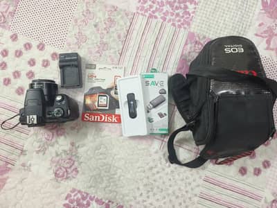 Canon SX50 Ha SLR Digital Camera [Result Attached] All accessories