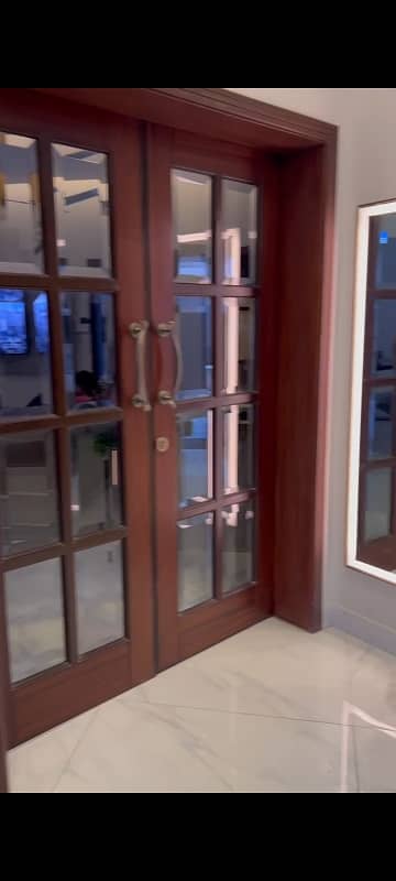 10 Marla Elegant House Facing Park For Sale In Bahria Town Prime Location.