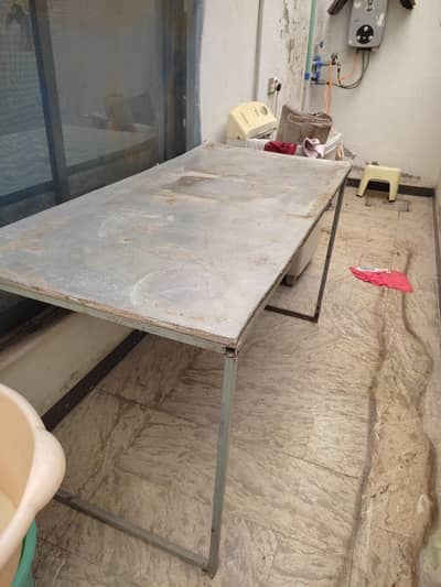 Iron table with lamination sheet on top suitable for counter & front