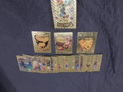 55 brand new  golden pockemon cards