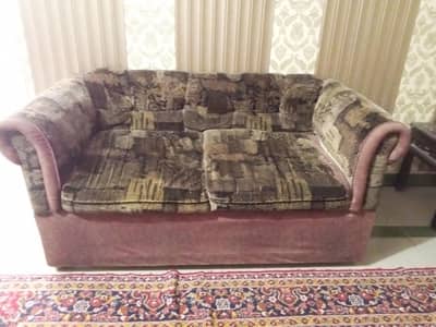 Two seater sofa in brown color velvet poshish