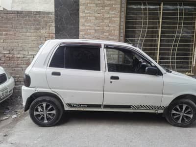 Daihatsu Coure 2004 golden number 6789