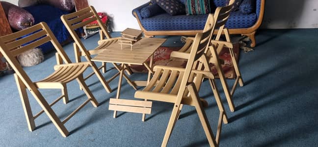 outdoor wooden chairs with table set