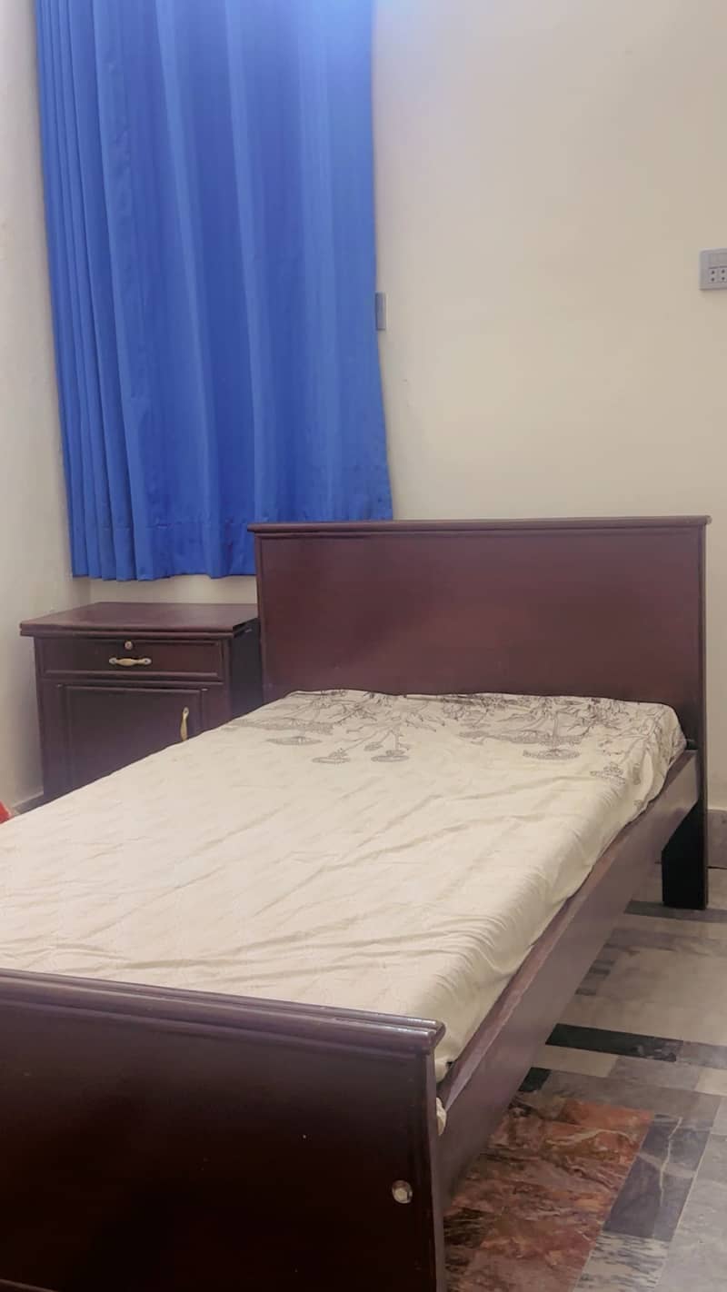 Bed and side table 0