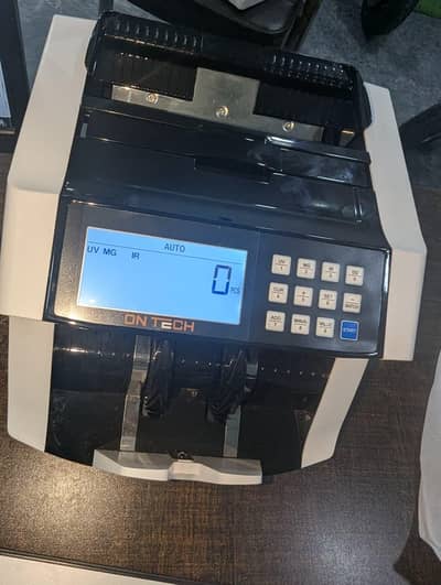 cash teller , currency counting machine