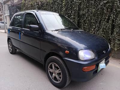 Daihatsu Cuore-CX 2004 Model Genuine Condition just Doors Shower