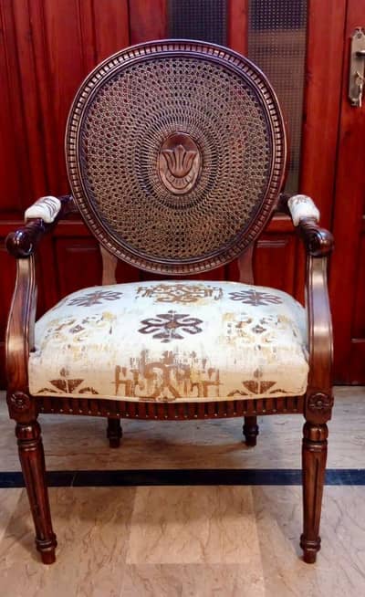 Two high cane coffee chairs