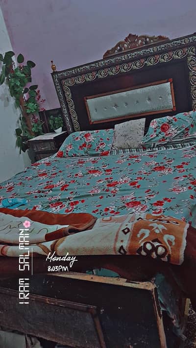 double bed ,dressing table,showcase,mattress and iron stands