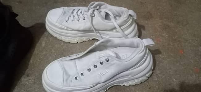 white beautiful shoes for both male and female